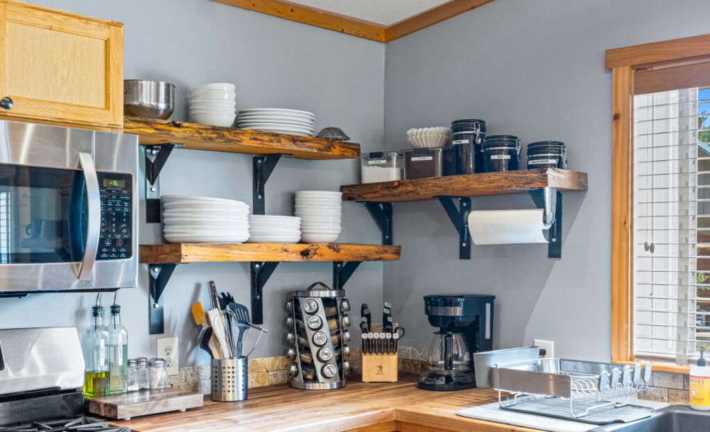 Kitchen coffee station at Bonanza Cabin with coffee maker and supplies.
