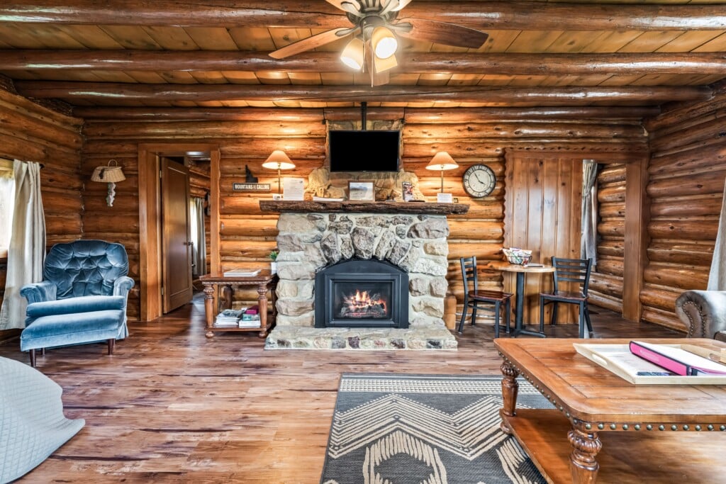 Stone gas fireplace inside Wall Street Cabin