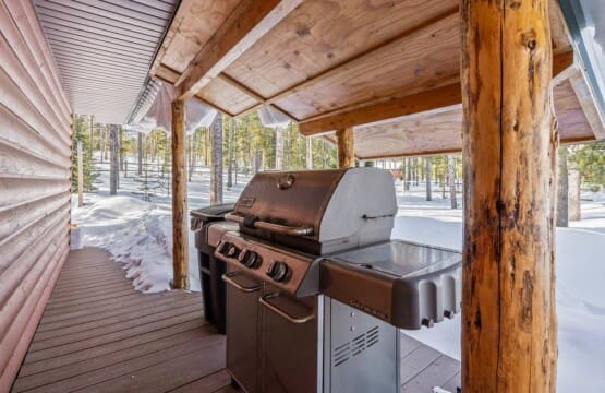 Gas grill on the covered porch at Bonanza Cabin.